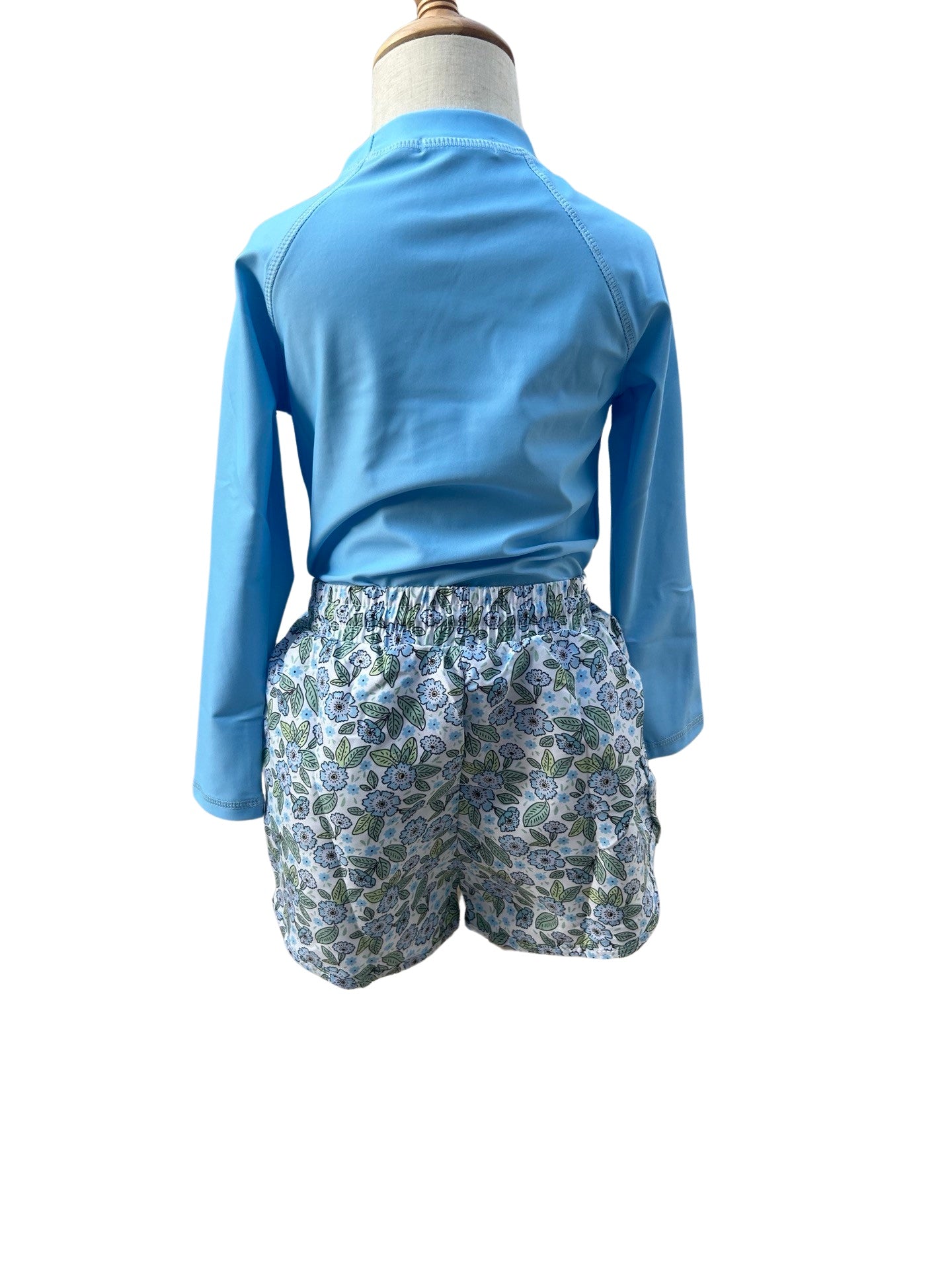 Flowers in blue rashguard + boardie