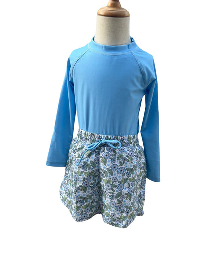 Flowers in blue rashguard + boardie